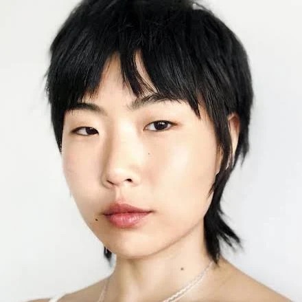 May Hong as Mira in KPop Demon Hunters
